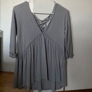 Grey top. Size small. Brand is Vestique.